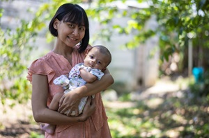 Arimacs Wilander - mother and baby Indonesian mother holding her baby.